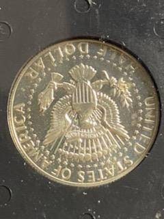 1969s Kennedy 40 percent silver half dollar, silver proof coin grades proof66 light cameo