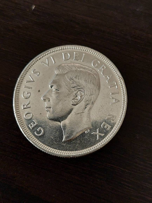 1950 Canadian silver dollar, king george foreign coin in high grade, coin collecting