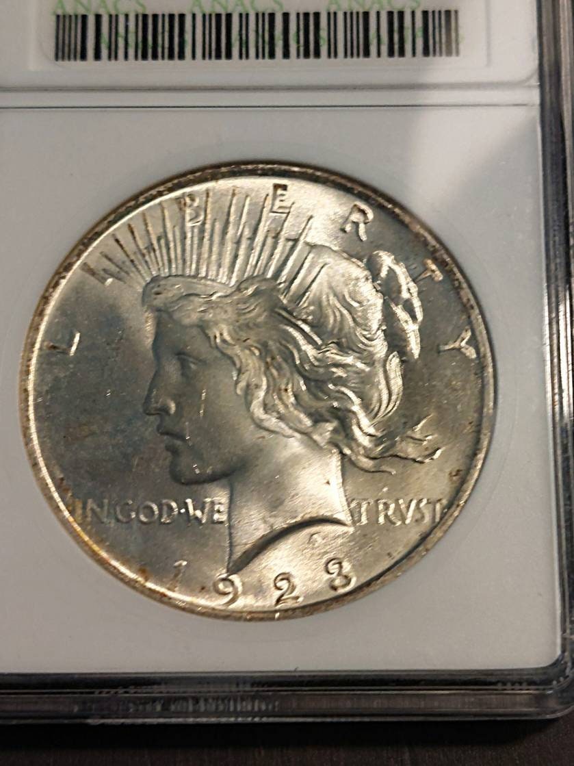 1923 silver peace dollar, graded ms64 brilliant uncirculated,  in old anacs soapbox holder,  coin collecting, free shipping