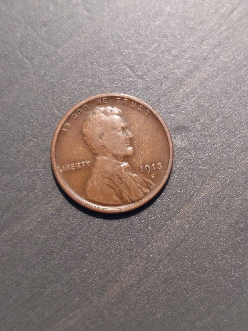 1913s Lincoln wheat cent,  early semi key date very good. Us coin collecting