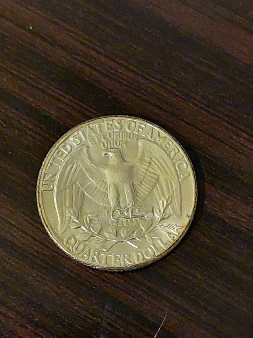 uncirculated Washington Silver Quarter coin, one uncirculated 1950s-1960s date mint state 90 percent silver quarter dollar, coin collecting
