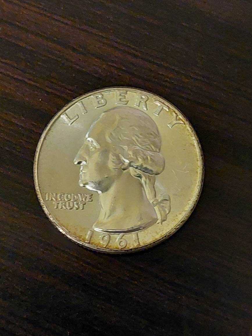 Washington Silver Quarter coin, one uncirculated 1950s-1960s date mint state 90 percent silver quarter dollar