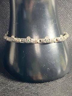 Vintage Irish claddagh interlocking sterling silver women's bracelet,  fabulous women's jewelry with small green gemstone.