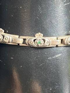 Vintage Irish claddagh interlocking sterling silver women's bracelet,  fabulous women's jewelry with small green gemstone.