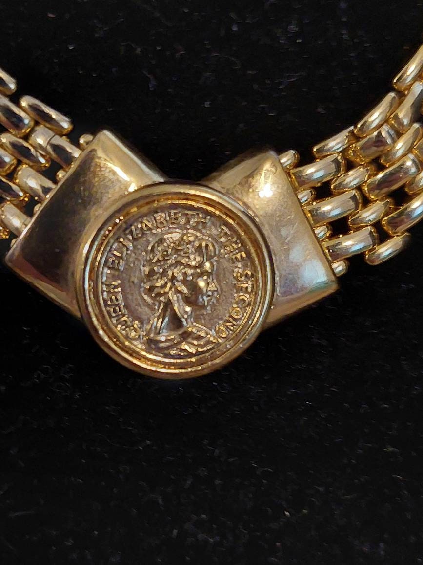 Vintage large gold toned women's statement necklace,  lovely piece with faux gold coin in center