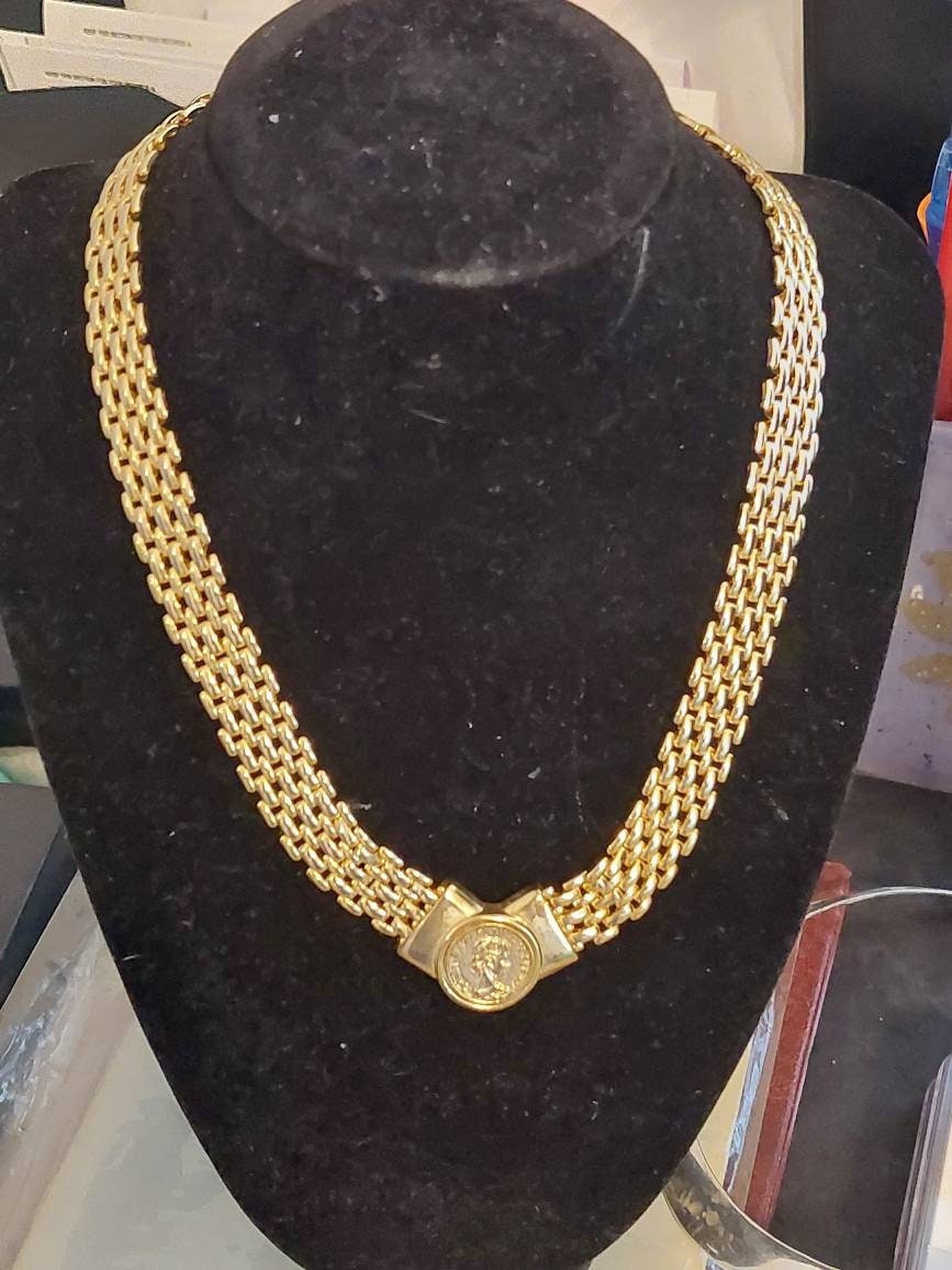 Vintage large gold toned women's statement necklace,  lovely piece with faux gold coin in center