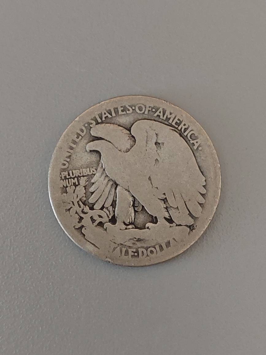 Walking liberty silver half dollar,  1917d obverse,  semi key date American coin collecting