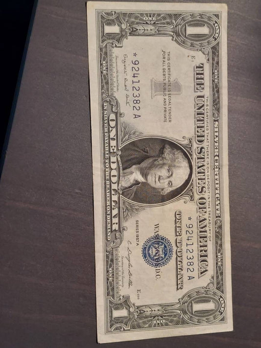 1957a one dollar silver certificate,  high grade blue seal STAR note American currency