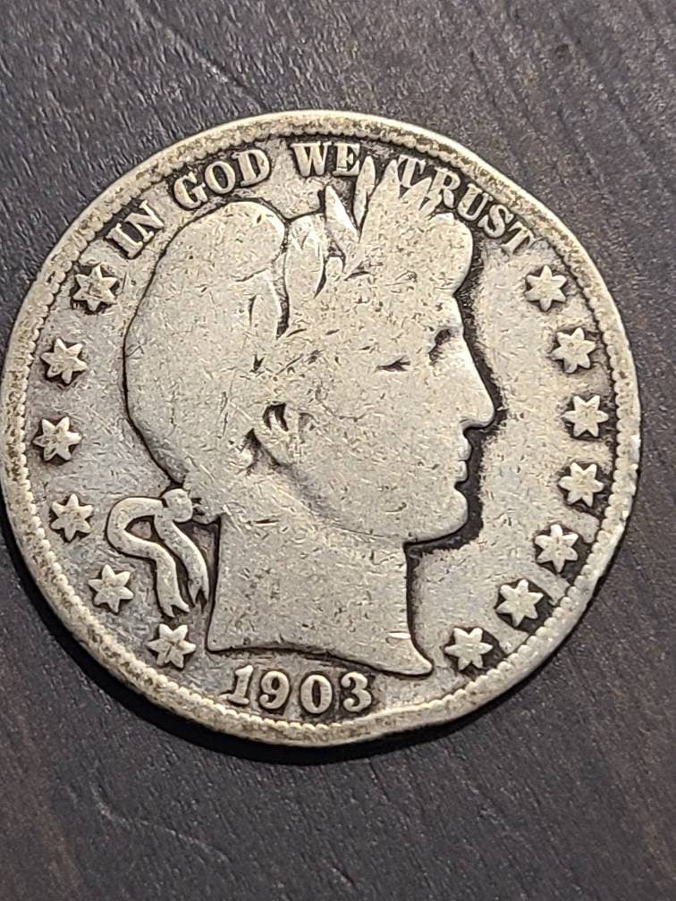 Barber half dollar silver coin. Random date 50 cent piece, us coin collecting hobby