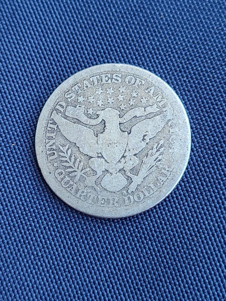 1897s key date barber silver quarter,  super rare low mintage  coin. Fantastic for the coin collector.