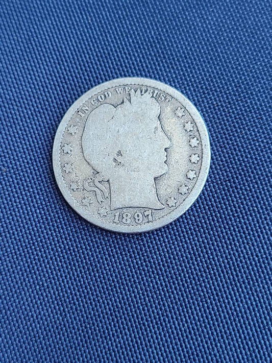 1897s key date barber silver quarter,  super rare low mintage  coin. Fantastic for the coin collector.