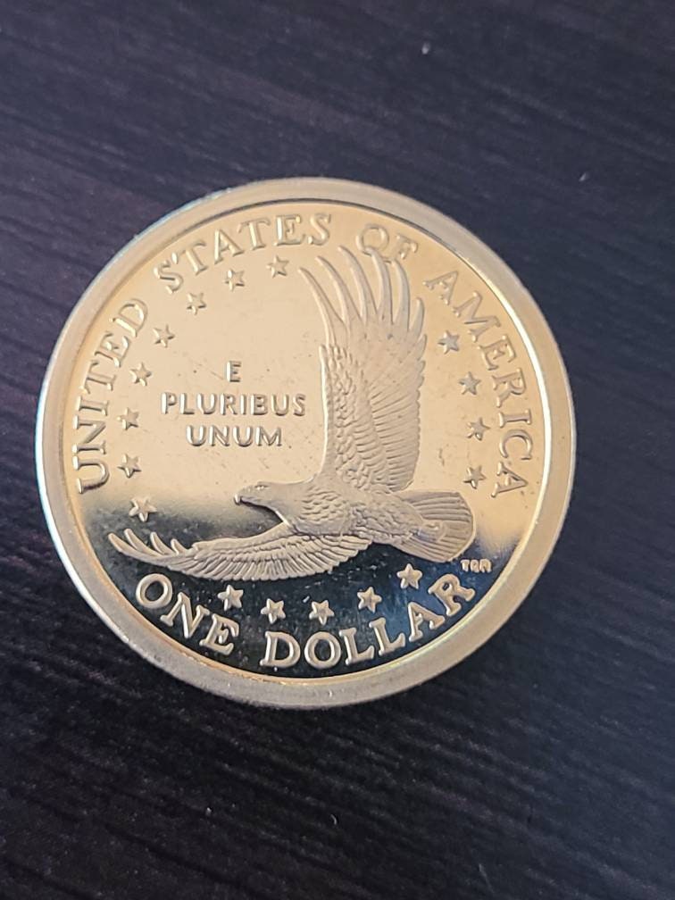 2000s proof sawagewea proof coins, you get one "gold dollar" proof from my collection