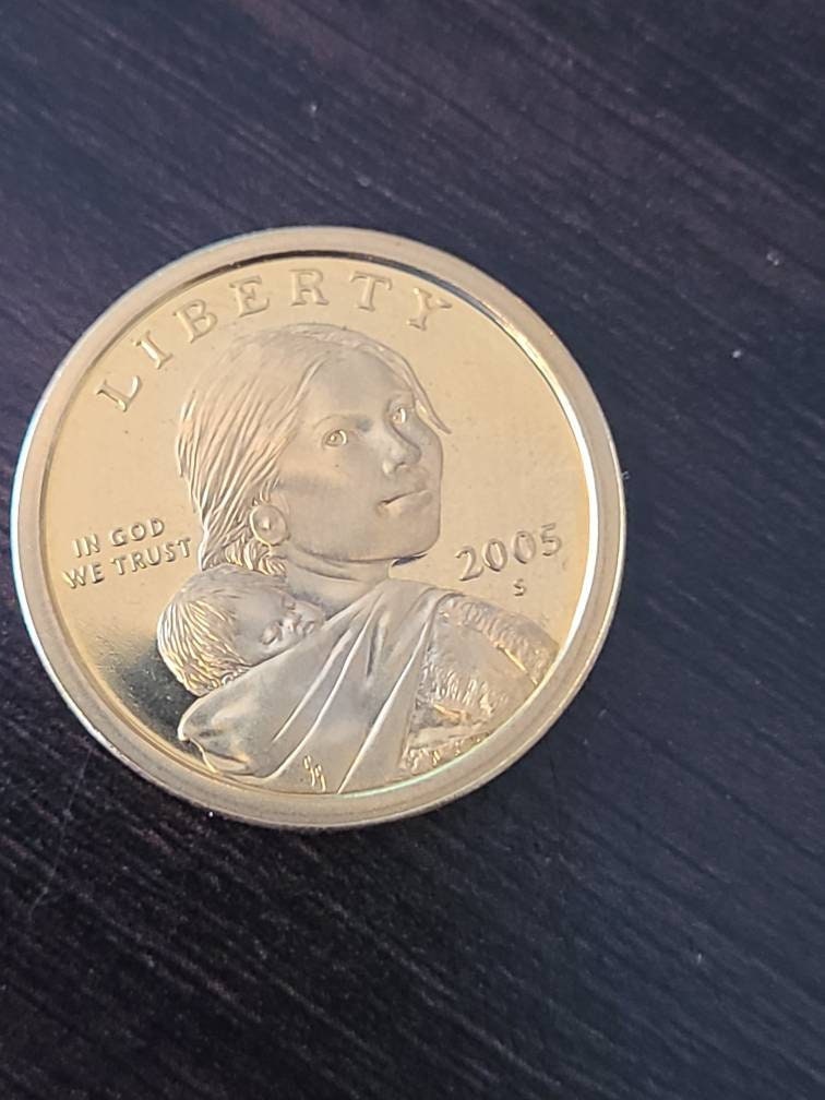 2000s proof sawagewea proof coins, you get one "gold dollar" proof from my collection