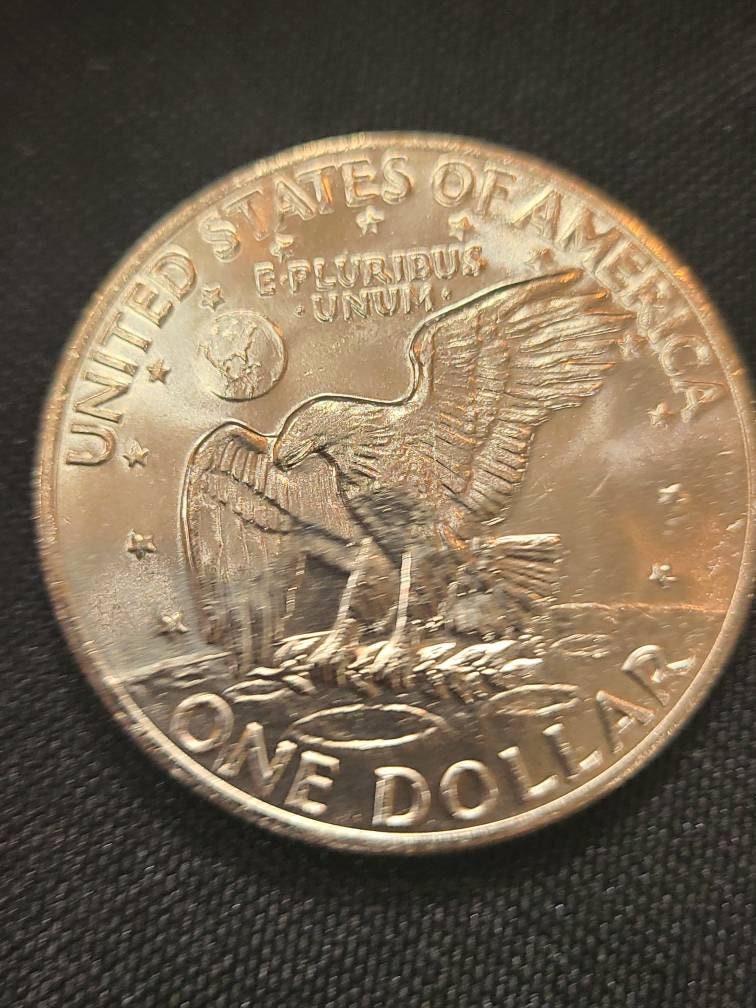1973 brilliant uncirculated ike dollar, low mintage year, only available in mint sets, vintage dollar coin