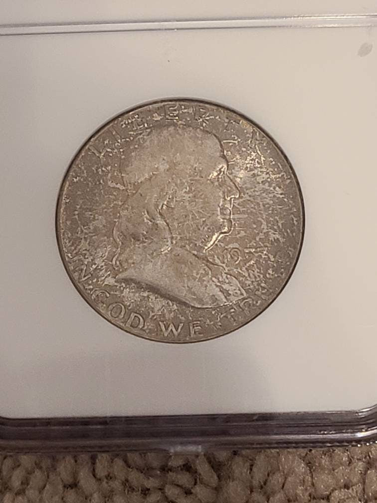 Ben Franklin silver half dollar, 1957p ngc ms65 gem uncirculated graded and toned Franklin half dollar
