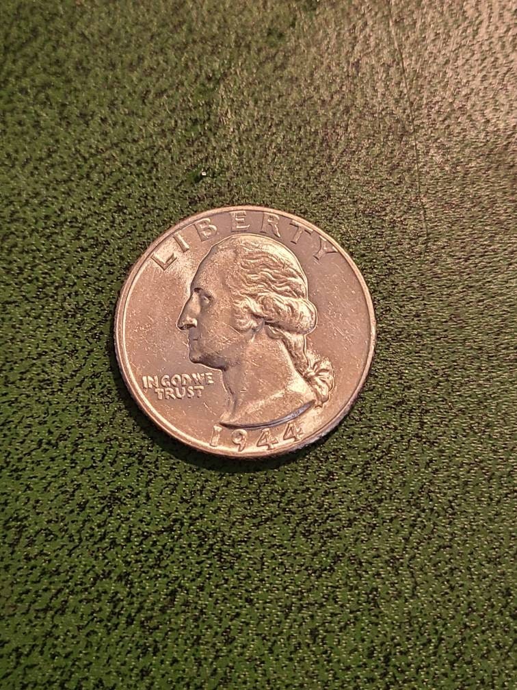 1944 silver Washington Quarter,  choice uncirculated and toned early American Quarter, blazer