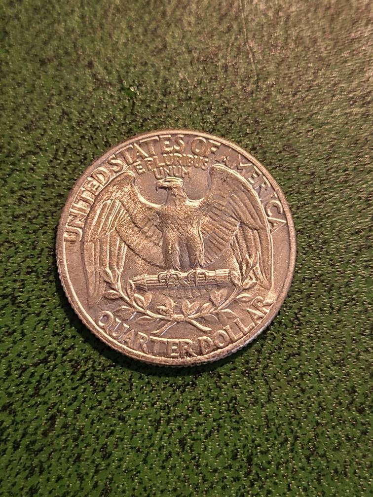 1944 silver Washington Quarter,  choice uncirculated and toned early American Quarter, blazer
