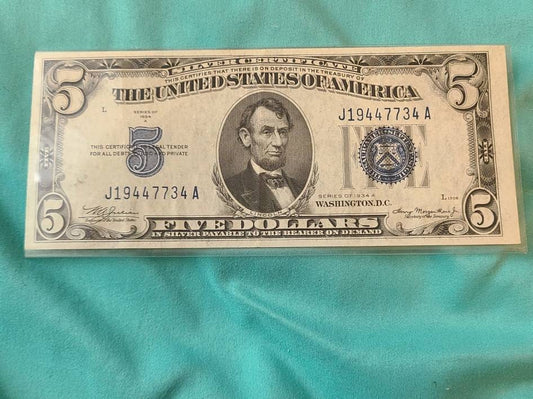 1934a high grade blue seal 5 dollar bill, antique silver certificate bill