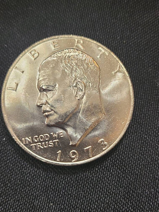 1973 brilliant uncirculated ike dollar, low mintage year, only available in mint sets, vintage dollar coin