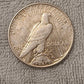 1927s peace dollar, semi key date low mintage 90 percent silver