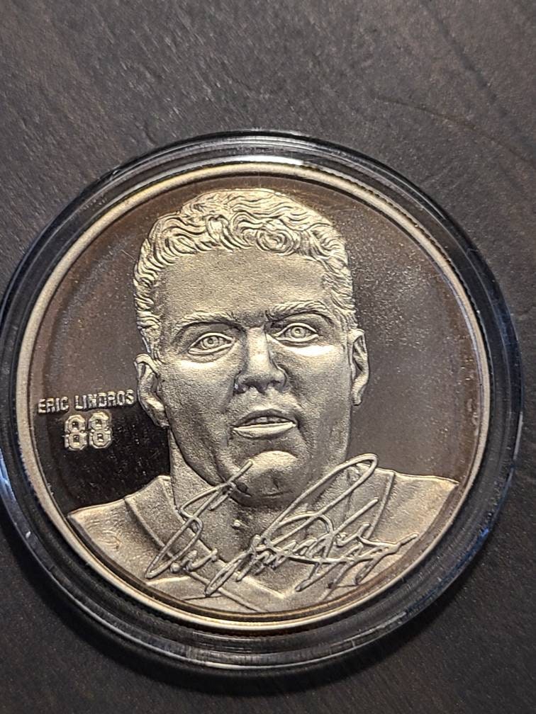 Vintage Eric lindros philadelphia flyers fine silver coin, collectible 999 silver bullion in keepsake black box, one ounce of silver
