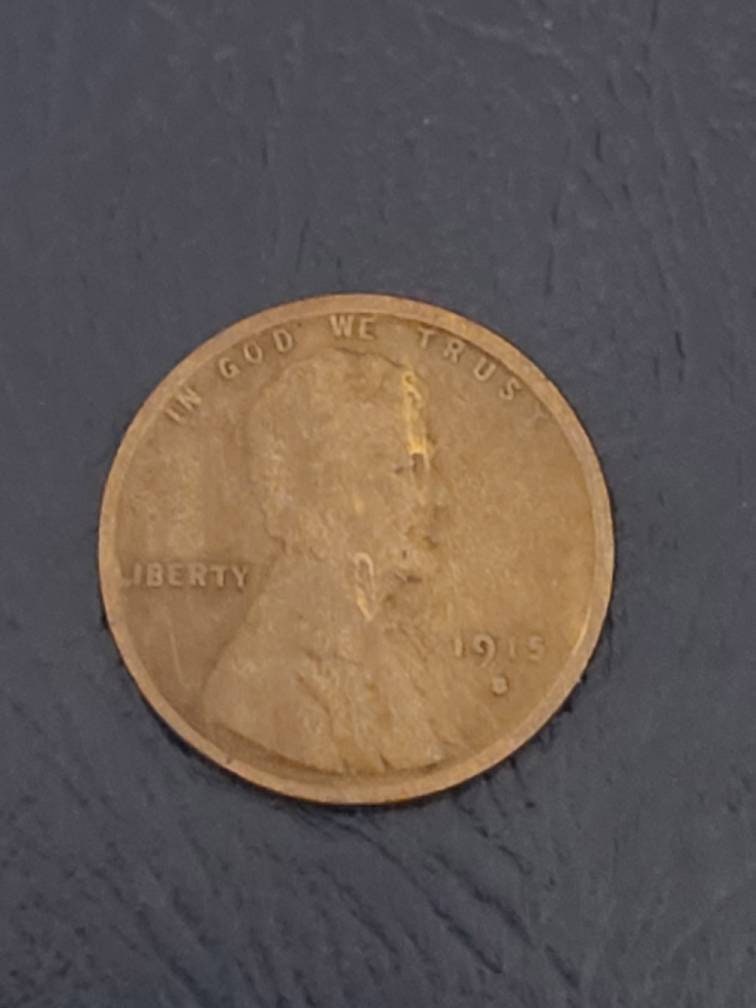 1915s semi key date, low mintage wheat cent, rare 100 year old coin, very good