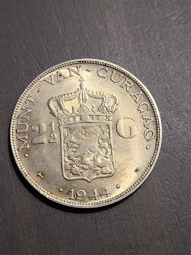 1944 netherlands large silver dollar sized 2 and a half gulden, high grade