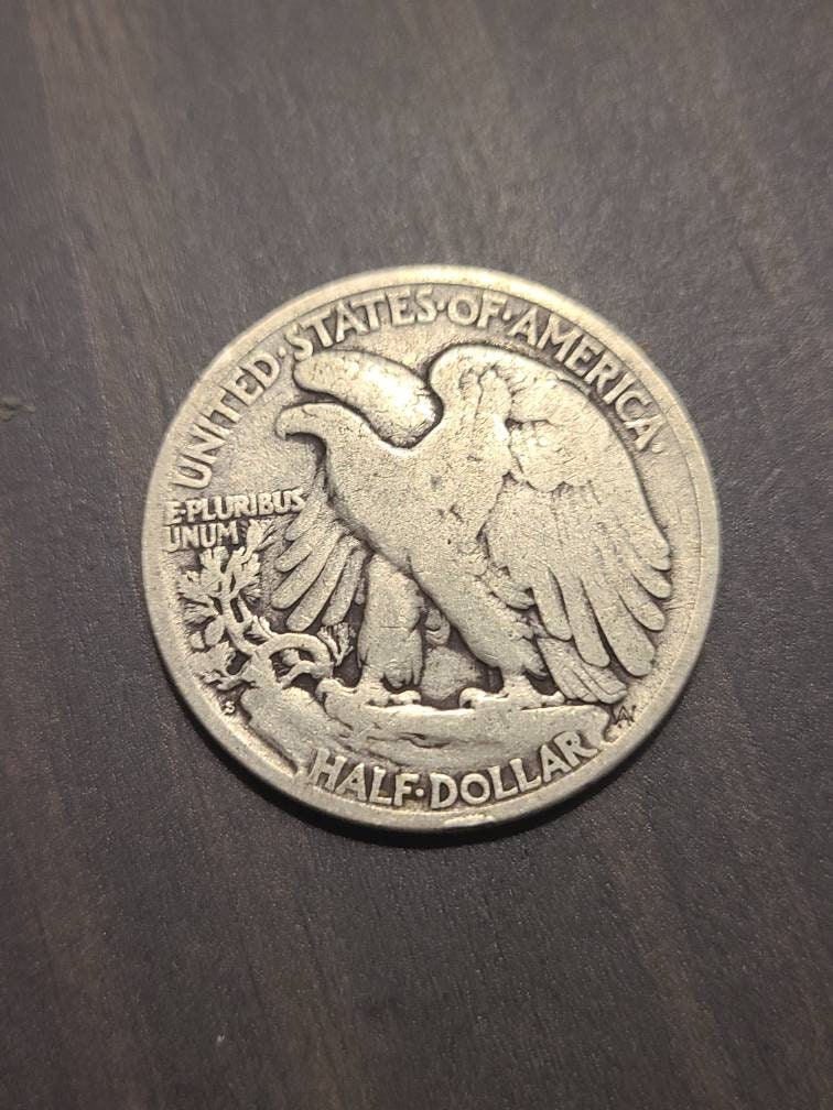 1923s walking liberty half dollar, rare date coin, vg+