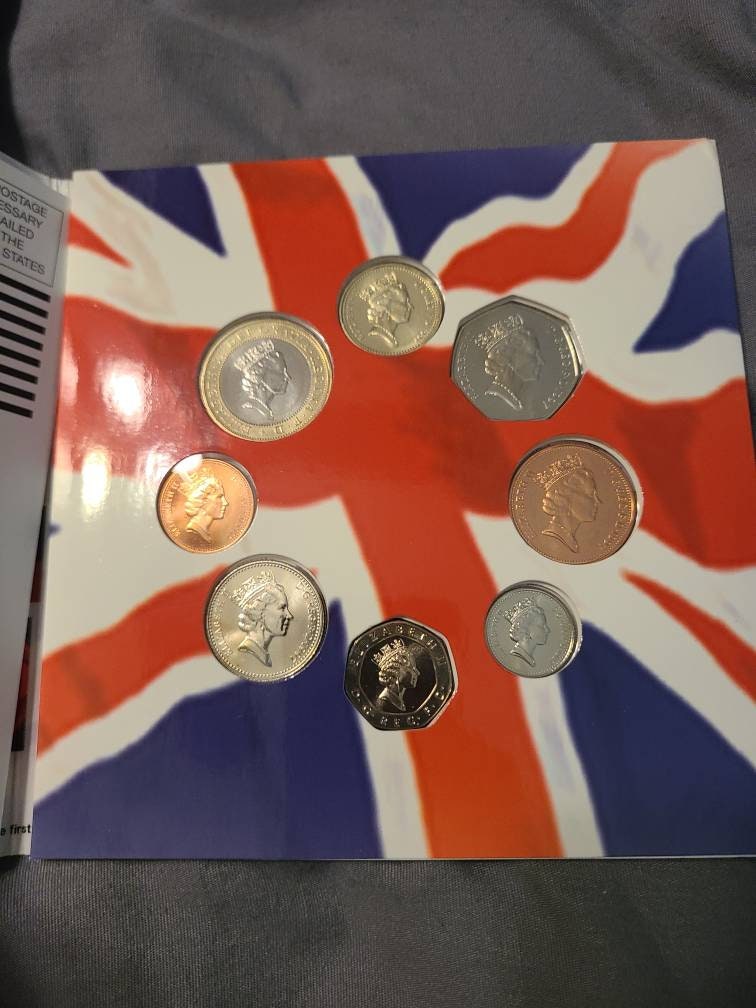 1997 united states and United Kingdom special mint uncirculated coin sets,informative multiple coin set with educational information