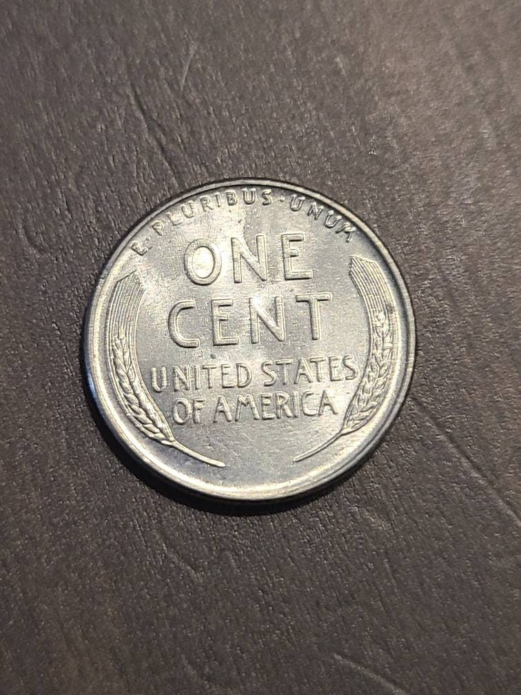1943 brilliant uncirculated Lincoln steel wheat penny, better date! Antique coin collecting,  gifts for him