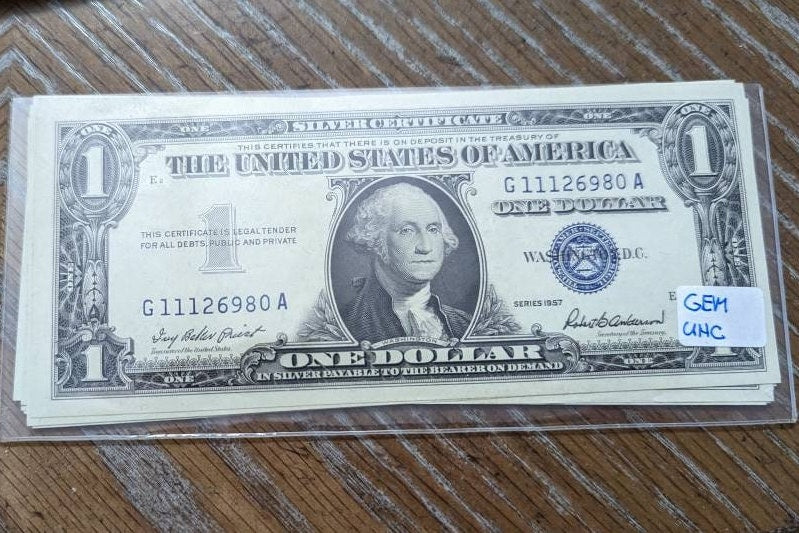 1957 gem Uncircumcised 1957 one dollar silver certificate bills, one random from my collection, stunning old paper money
