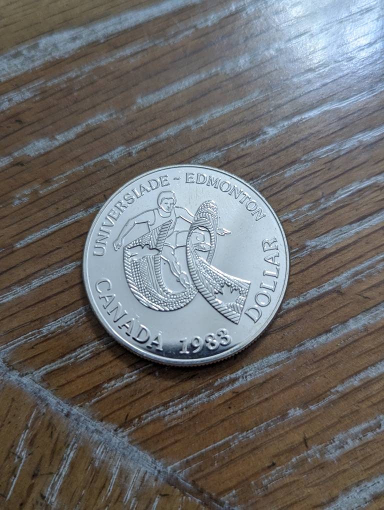 1983 Canada silver university of Edmonton toner,  dollar, beautiful large foreign silver coin