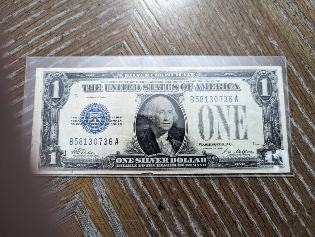 1928 one dollar funny back silver certificate,  antique dollar bill, coin collecting  beautiful condition
