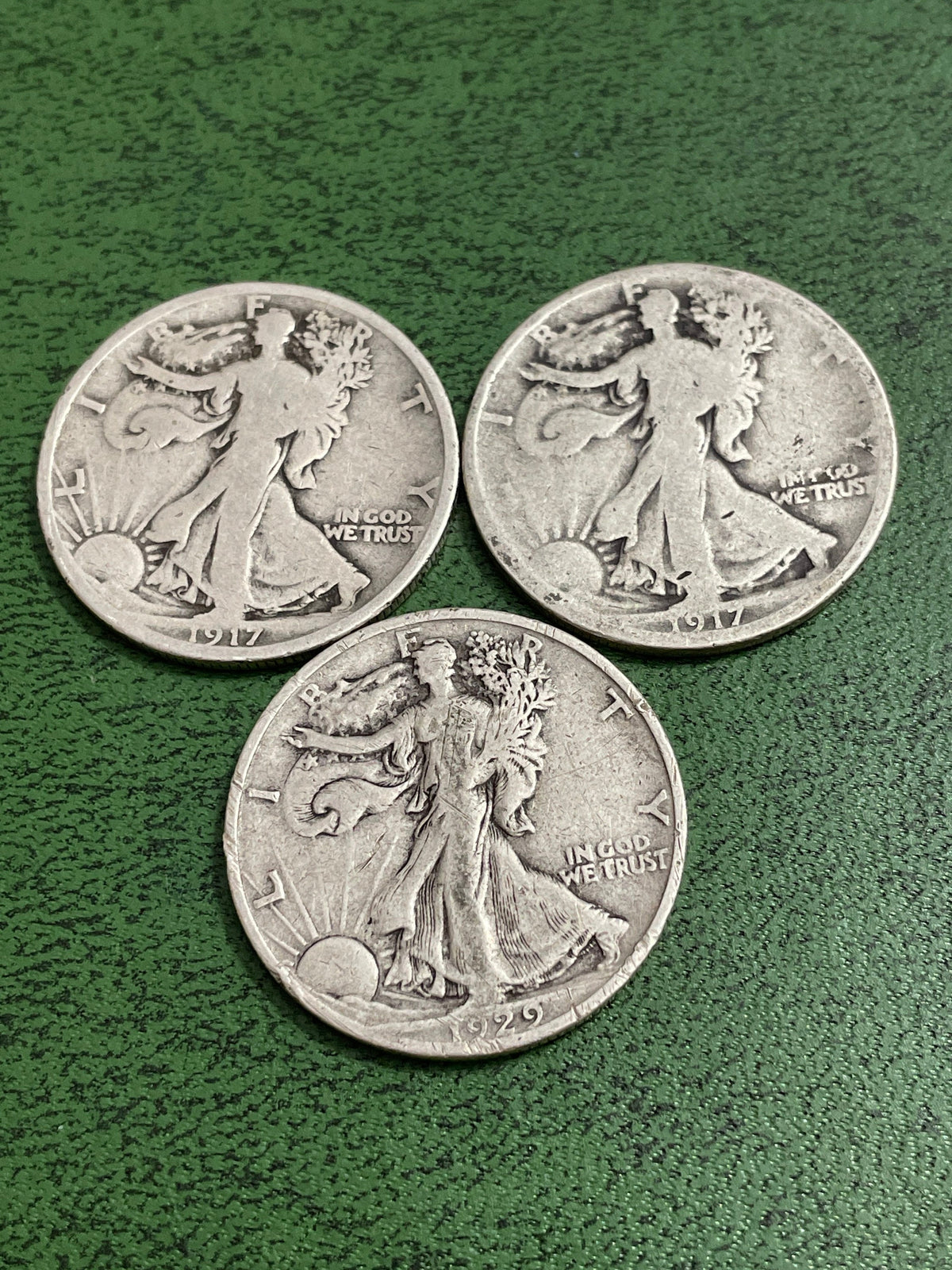 2 1917 silver half dollars and 1 silver 1929 half dollar