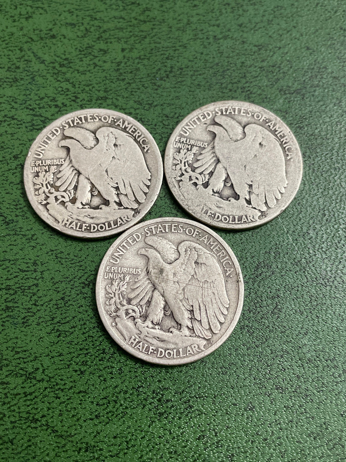 2 1917 silver half dollars and 1 silver 1929 half dollar