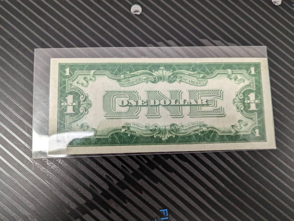 1928a one dollar funny back silver certificate,  antique dollar bill, coin collecting  beautiful condition