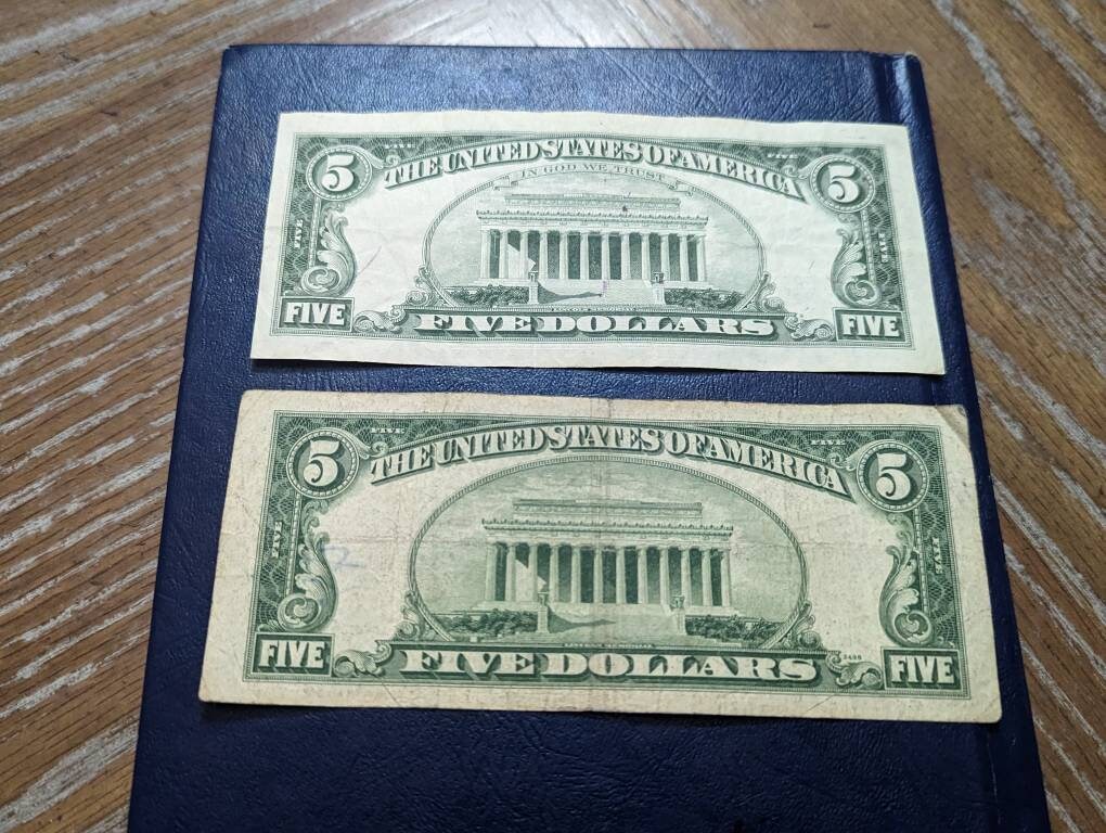 Two 1950s five dollar, one is a star note, red seal notes plus bonus gift