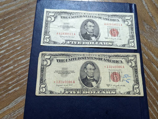 Two 1950s five dollar, one is a star note, red seal notes plus bonus gift