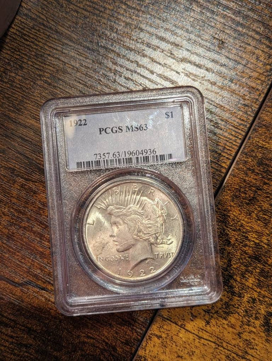 1922 beautiful UNC silver peace dollar, pcgs graded md63 old silver dollar includes free gift