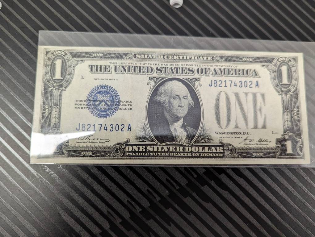 1928a one dollar funny back silver certificate,  antique dollar bill, coin collecting  beautiful condition