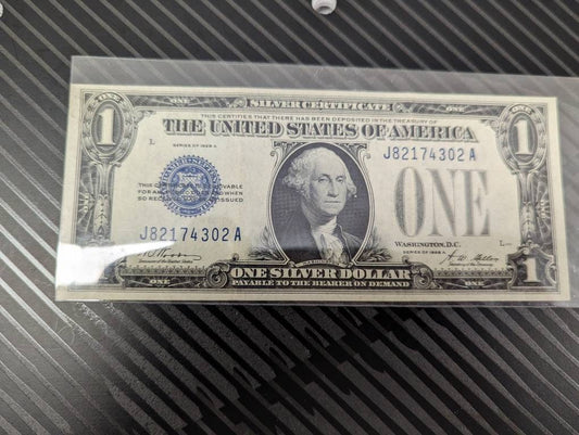 1928a one dollar funny back silver certificate,  antique dollar bill, coin collecting  beautiful condition